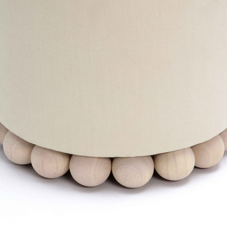 High angle view of Dex round footstool showing even top cushion