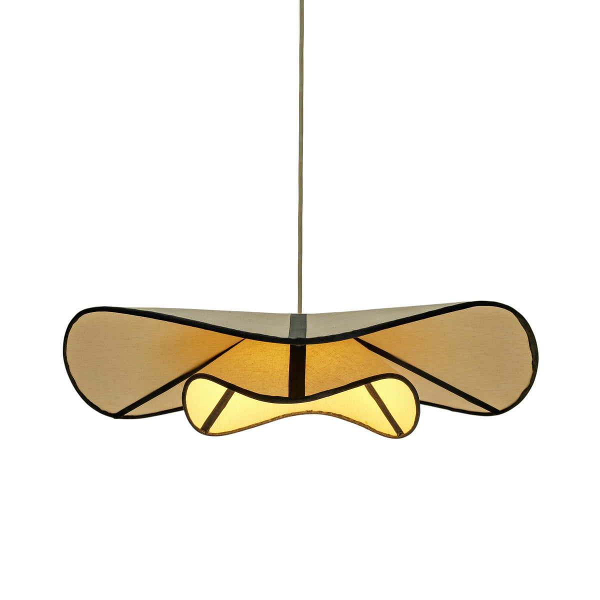 Chapeau Du Matin pendant lamp illuminated above a modern dining room setup