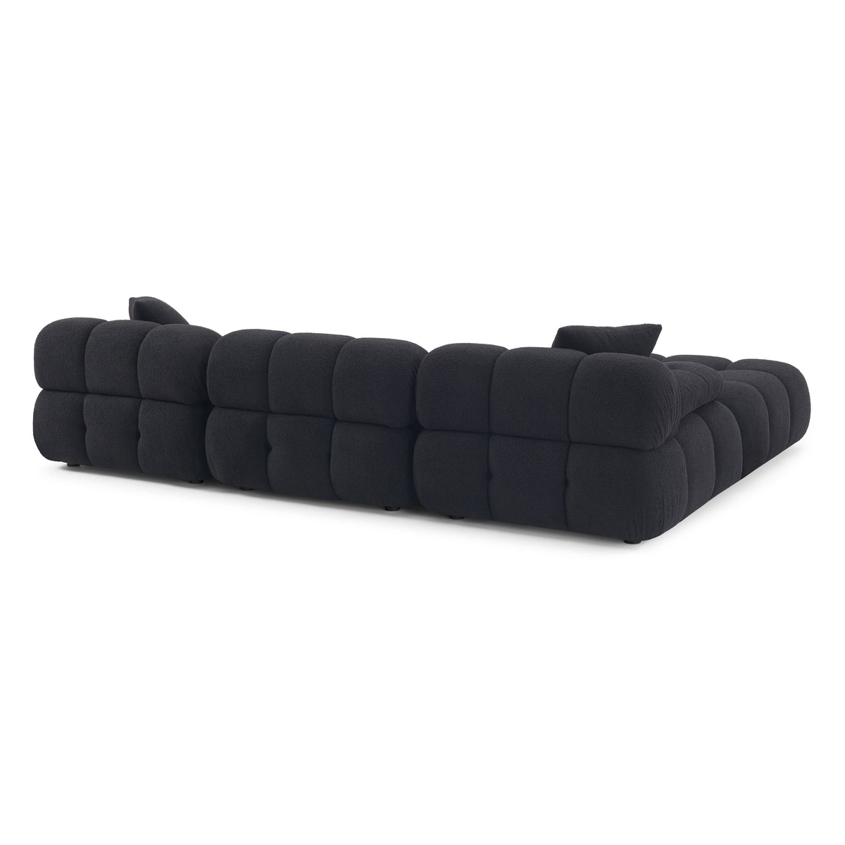 Calliope sectional armless chair rear view highlighting solid back support