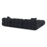 Calliope sectional armless chair rear view highlighting solid back support