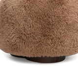 Oopa Swivel Ottoman styled in a light-filled contemporary bedroom corner
