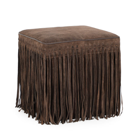 Daphne square suede fringe ottoman placed next to a sleek sofa coffee table