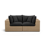 Cali 80-inch outdoor loveseat isolated against white studio backdrop