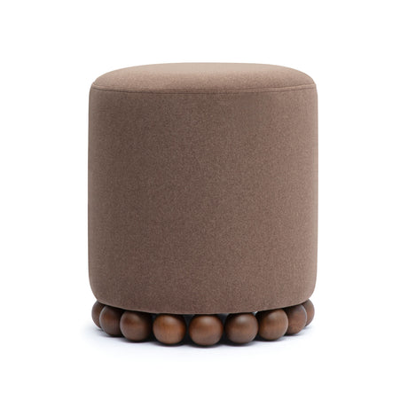 Dex circular footrest showing stable wood base construction
