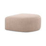 Gorge ottoman functioning as a central cocktail table footrest in a contemporary lounge
