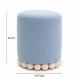 Rear view of Dex round upholstered ottoman