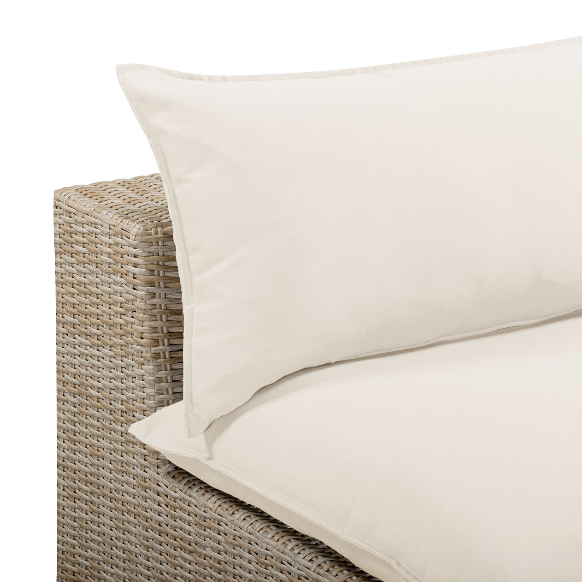 Poolside deck lifestyle scene featuring the Cali performance fabric wicker armless chair
