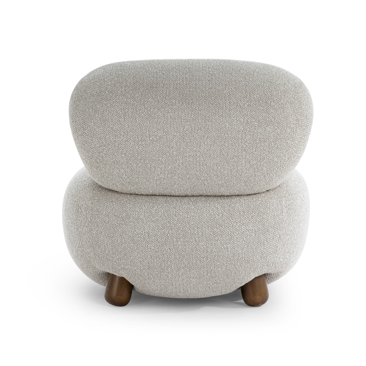 Pucker Accent Chair arranged beside a wooden side table in an organic modern living room