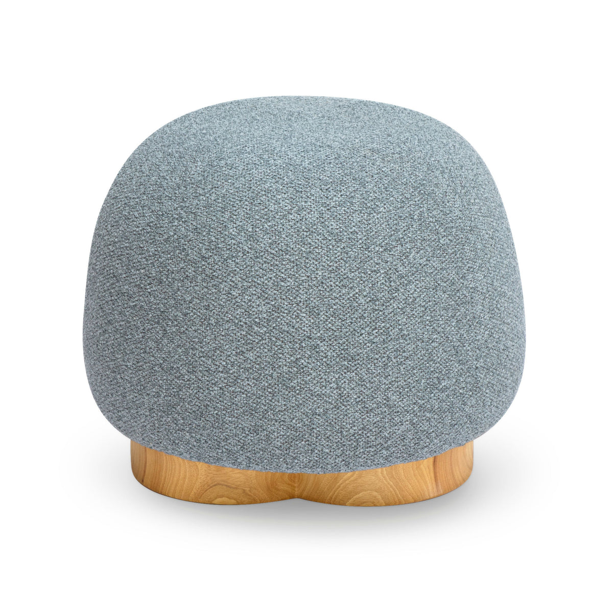 Oopa Swivel Ottoman placed alongside an organic modern coffee table