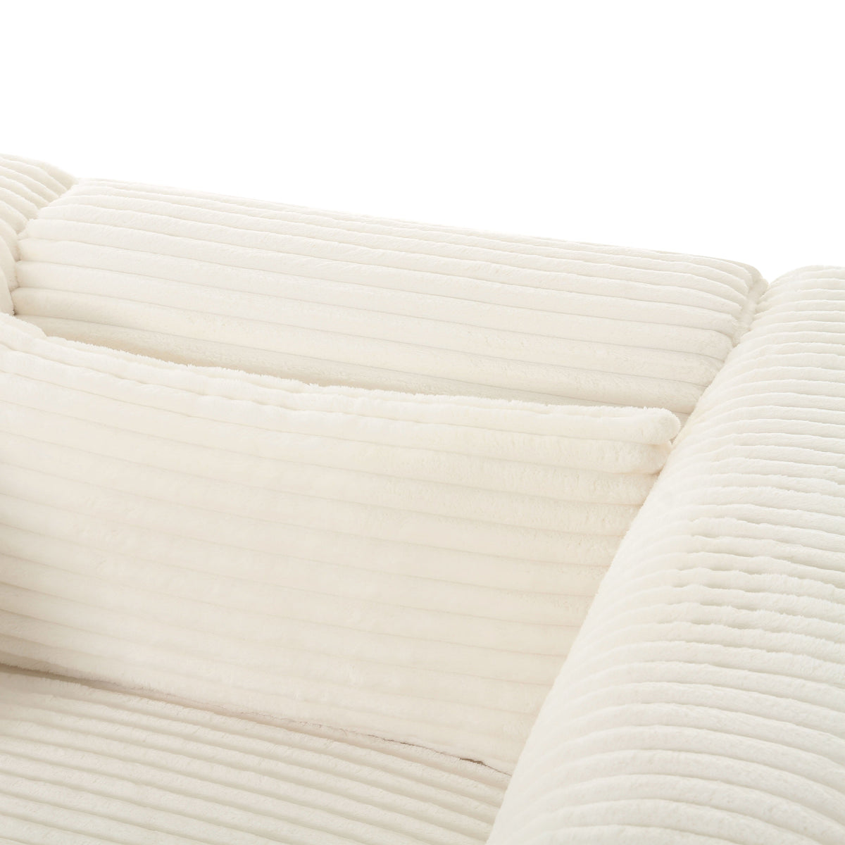 Detailed shot of wide-channeled corduroy seat cushion texture and stitching
