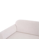 Close-up of cream textured performance fabric upholstery on the Gorge modular loveseat