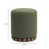 Dex compact accent ottoman in cozy apartment setting
