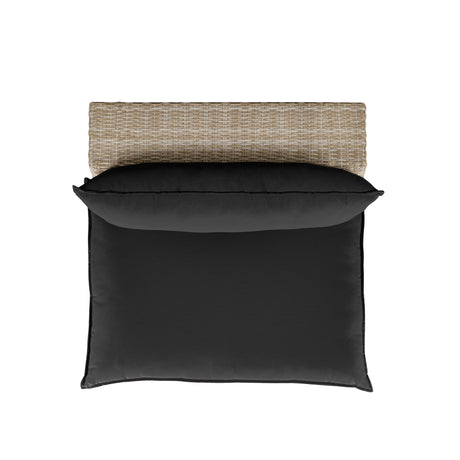 Three-quarter view of the Cali black wicker outdoor chair with plush black back cushion