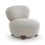 Three-quarter angle view of the Pucker Accent Chair highlighting rounded contours