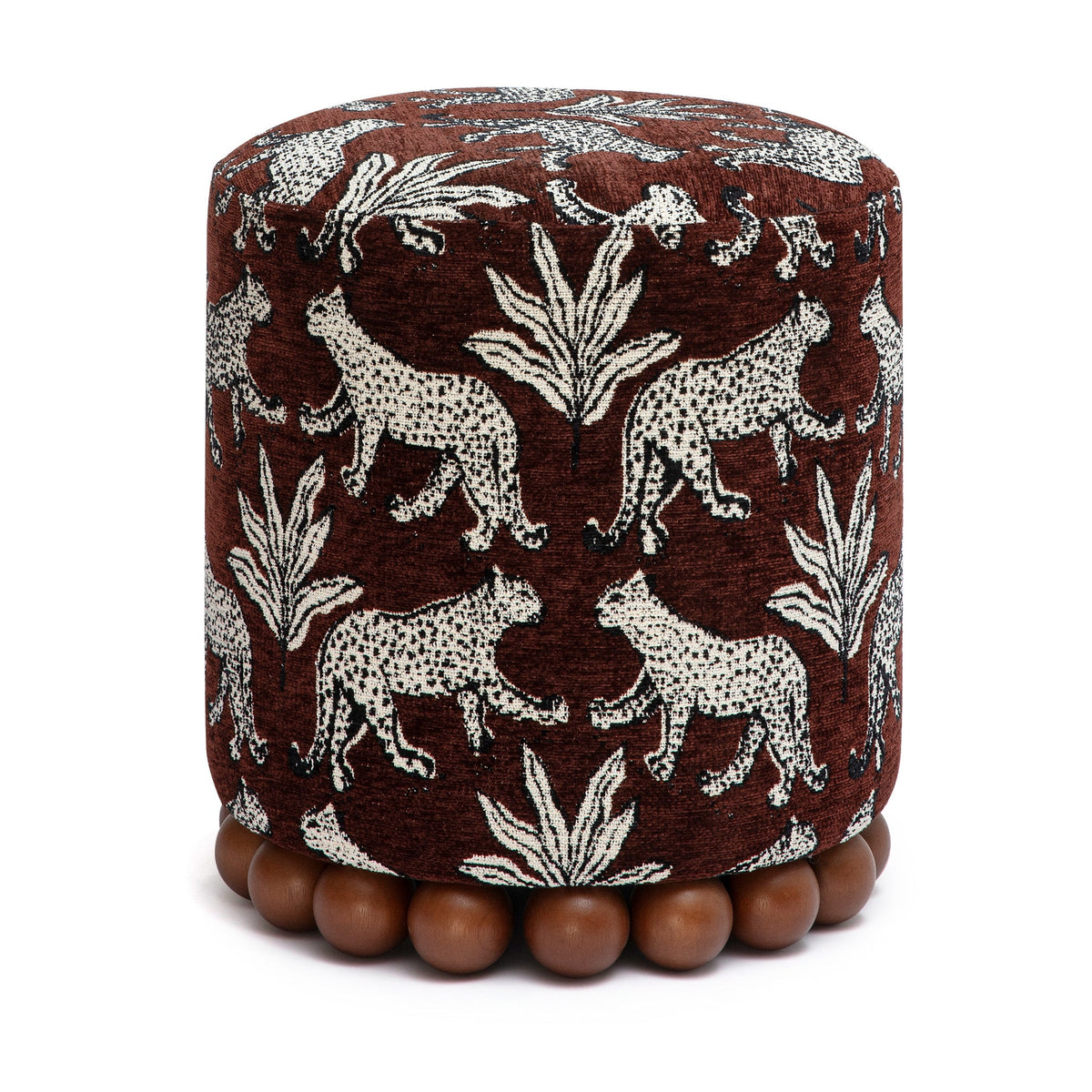 Close-up of decorative spherical wooden ball feet on Dex ottoman