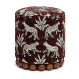 Close-up of decorative spherical wooden ball feet on Dex ottoman