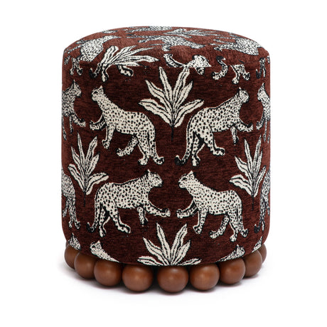 Close-up of decorative spherical wooden ball feet on Dex ottoman