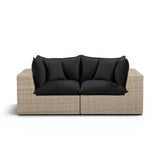 Cali outdoor loveseat with black performance fabric cushions and dark brown legs