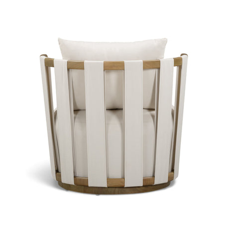 Paolo outdoor accent chair angled side perspective showing curved back