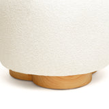 Oopa Swivel Ottoman showing solid structure under hand compression