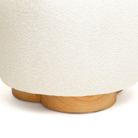 Oopa Swivel Ottoman showing solid structure under hand compression
