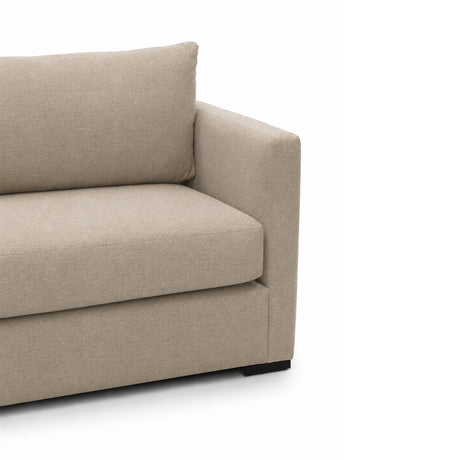 Portsmouth 85 Inch Sofa beige fabric angled perspective in spacious family room