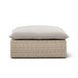 Cali Outdoor Ottoman in Grey Fabric and Natural Wicker angled front perspective