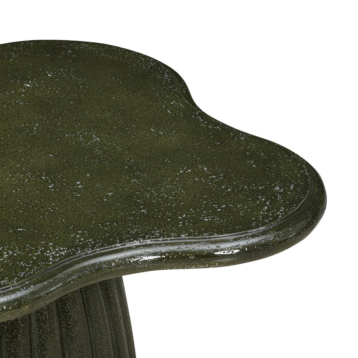 Addison green concrete table styled outdoors on a stone patio setting