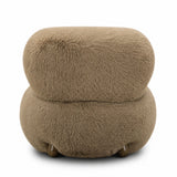Contract-grade Pucker Accent Chair positioned in a boutique commercial lounge space