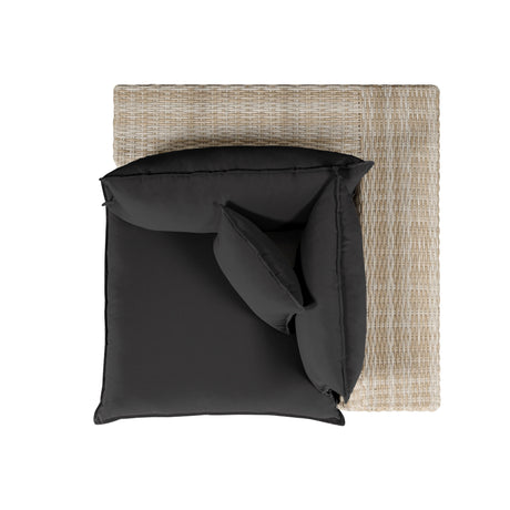 Rear angle of black and natural wicker Cali patio corner chair