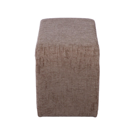 Alvie upholstered side table styled with books on the bottom shelf