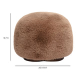 Oopa Swivel Ottoman positioned as an accent footstool near a lounge chair