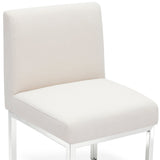 Top-down view of Pensel Dining Chair showcasing compact proportions and tailored fabric finish