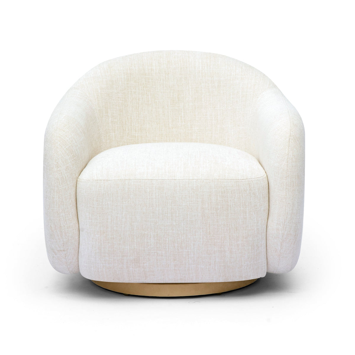 FOAK Salma swivel chair styled beside an end table in an open-concept living area