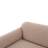 Close-up of tan performance woven upholstery texture on the Gorge modular loveseat