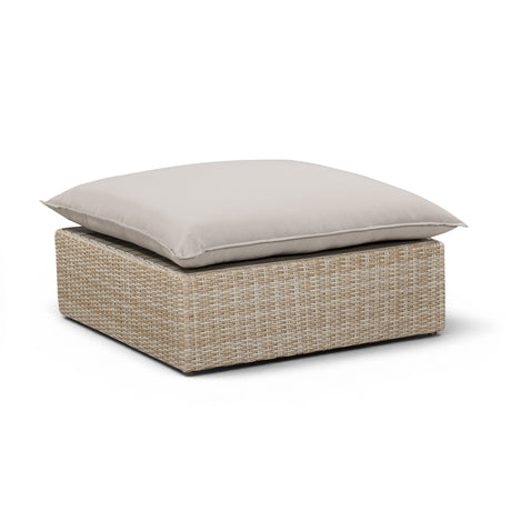 Cali Outdoor Ottoman in Grey Fabric and Natural Wicker angled front perspective