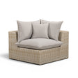 Cali Outdoor Corner Chair angled perspective showing grey cushions and woven wicker texture