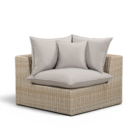 Cali Outdoor Corner Chair angled perspective showing grey cushions and woven wicker texture