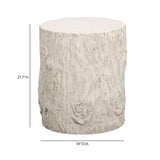Organic modern concrete side table positioned beside patio lounge seating