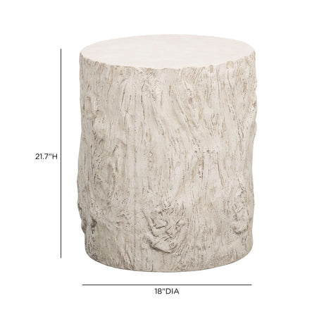 Organic modern concrete side table positioned beside patio lounge seating