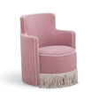Passe Tasseled Velvet Swivel Accent Chair in Pink angled side perspective