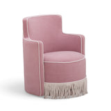 Passe Tasseled Velvet Swivel Accent Chair in Pink front view