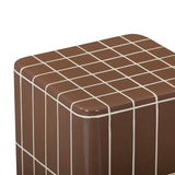 Tatiana square side table positioned in modern indoor living room setting