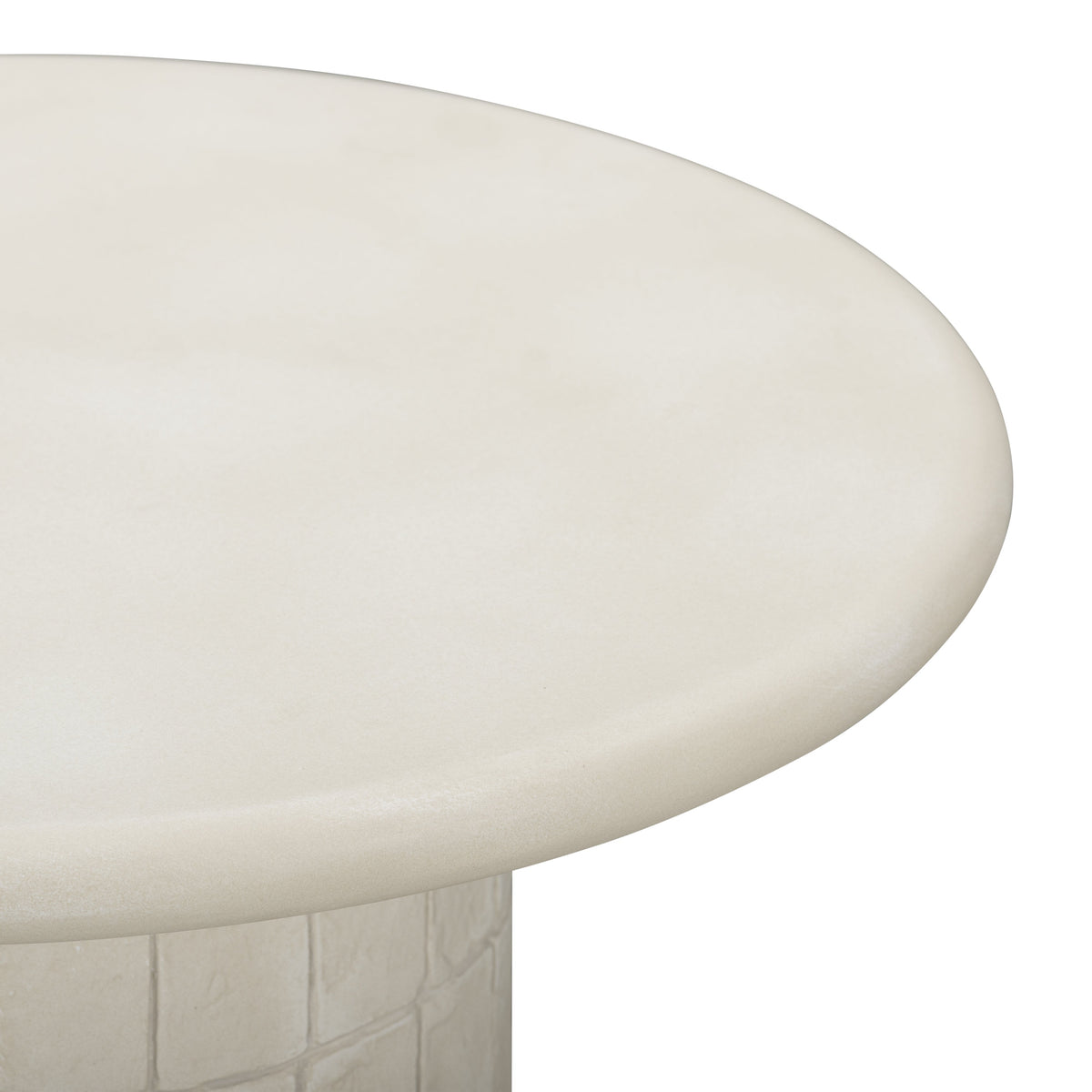 Fafo sculptural concrete side table arranged beside contemporary living room sofa