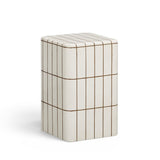 Close-up of ecru faux ceramic glazed surface on square concrete table