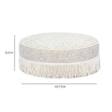 Overhead angled view of Tassy Tasseled Round Ottoman showing firm cushioned seat