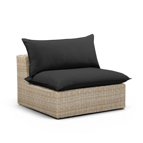 Detailed texture of natural all-weather resin wicker weave on the Cali armless chair base