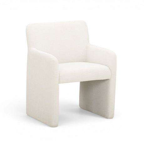 Crawley upholstered dining armchair angle perspective highlighting rounded arms