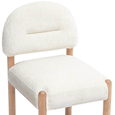 Side profile showing ergonomic curve and lumbar support of Bruno dining chair