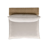 Three-quarter profile of the grey cushion and brown wicker Cali modular patio chair